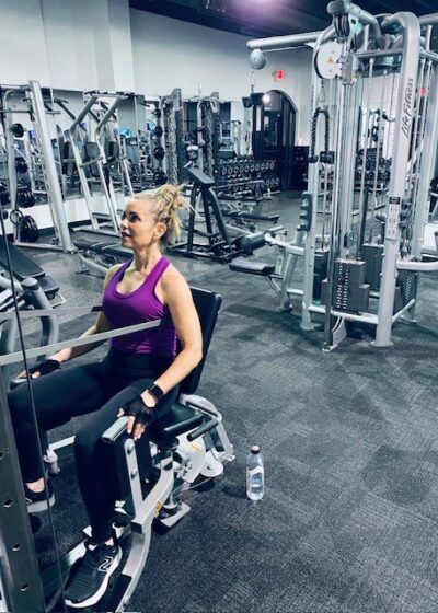 Danielle working on the hip abduction/adduction. No crowding whatsoever at our 24 hour gym. The facility looks beautiful at night, and is wide open.