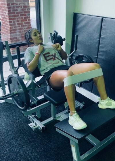 Shayli working on the hip thrust machine. Fitness training for tennis